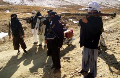 Taliban fighters display their weapons during a patrol in Ghazni province on January 23, 2010.  The commander of NATO-led troops in Afghanistan has said foreign fighters allied with the Taliban cannot be "reintegrated" into Afghan society and some may have to be killed or captured.  Plans by Kabul to persuade Taliban members to lay down their arms would not apply to foreigners who had joined the insurgency, often for ideological reasons, US General Stanley McChrystal suggested in a NATO video posted on the web on.  TOPSHOTS AFP PHOTO/STR